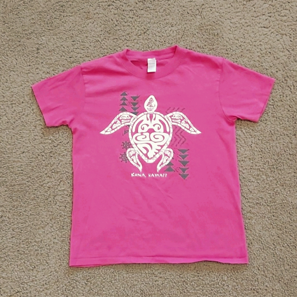 Pink Hawaiian shirt.